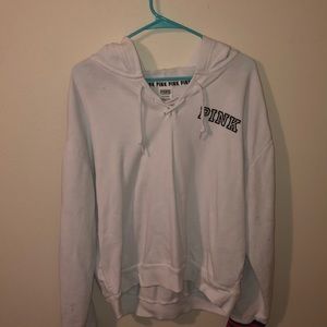 PINK sweatshirt with grey/blue stripes on sleeves